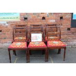 A SET OF SEVEN 19TH CENTURY MAHOGANY DINING CHAIRS WITH DROP-IN TAPESTRY SEATS RAISED ON REEDED