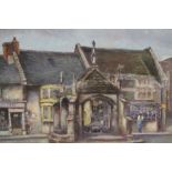 AN OAK FRAMED OIL ON BOARD OF A STREET SCENE WITH FIGURE BESIDE A MONUMENT SIZE - 44CM X 38CM