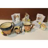 THREE BEATRIX POTTER MUSIC BOXES TOGETHER WITH TWO ROYAL DOULTON CHARACTER JUGS AND ANOTHER (6)