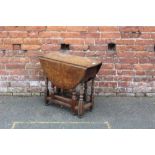 AN ANTIQUE OAK SMALL DROPLEAF TABLE H-61 W-116 CM