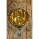 A VINTAGE BRASS JAM PAN