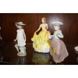 A ROYAL DOULTON PRETTY LADIES SUMMER FIGURE HN5322 TOGETHER WITH TWO NAO FIGURES - ONE IS A/F