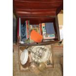 A VINTAGE TIN TRUNK CONTAINING ASSORTED BOOKS ETC TOGETHER WITH A TRAY OF SUNDRIES INCLUDING A