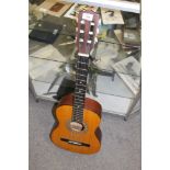 A CHILDS ENCORE ACOUSTIC GUITAR