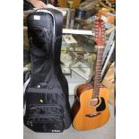 A TAKAMINE TWELVE STRING GUITAR MODEL GD 30-12NAT WITH A CARRY BAG