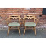 ERCOL - A PAIR OF VINTAGE ARMCHAIRS
