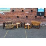 A COLLECTION OF FOUR ASSORTED STOOLS, SMALL TABLE AND A MAGAZINE RACK (6)
