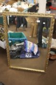 A GILT FRAMED MIRROR 39.5 CM X 27 CM