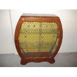 AN UNUSUAL VINTAGE BOWED WALNUT CHINA DISPLAY CABINET