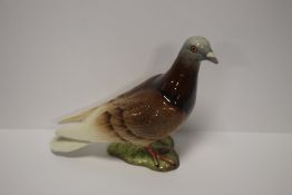 A BESWICK BROWN PIGEON