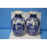 A PAIR OF ORIENTAL STYLE BLUE & WHITE VASES VARIOUS DAMAGES AND REPAIRS