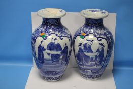 A PAIR OF ORIENTAL STYLE BLUE & WHITE VASES VARIOUS DAMAGES AND REPAIRS