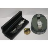 A BOXED CITIZEN WRISTWATCH, A SECRETS FROM HIDDEN TREASURE FROG, AND A BOXED PEN