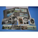 A COLLECTION OF POSTCARDS, loose and in albums, general types to include some real photograph and