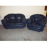 A TWO PIECE BLUE LEATHER SUITE, COMPRISING TWO SEATER SOFA AND A CHAIR