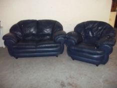 A TWO PIECE BLUE LEATHER SUITE, COMPRISING TWO SEATER SOFA AND A CHAIR