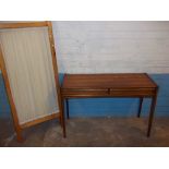 A TWO DRAWER TEAK SIDEBOARD / DESK TABLE AND A PRIVACY SCREEN (2)