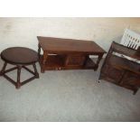 A HEAVY OAK LINEN FOLD STYLE OLD CHARM COFFEE TABLE, AN OAK CIRCULAR OCCASIONAL TABLE AND A