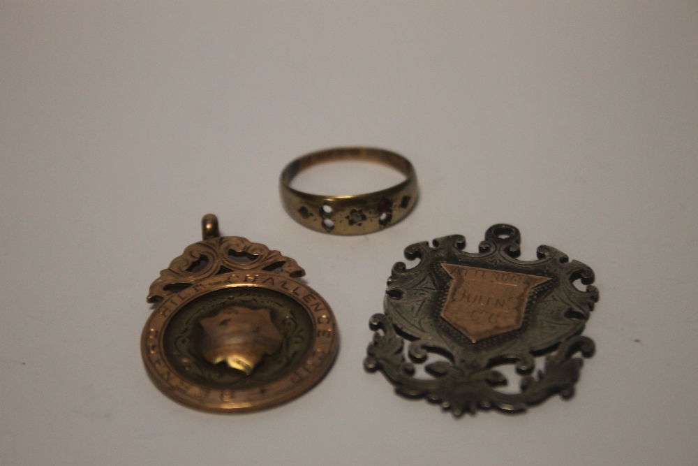 A 9 CT GOLD FOB MEDAL, A 9 CT GOLD RING A/F AND A SILVER FOB