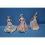 TWO COALPORT FIGURINES "SPECIAL CELEBRATION, AND GOOD LUCK", TOGETHER WITH AN UNNAMED FIGURINE