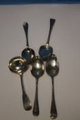 FOUR GEORGIAN SILVER SPOONS AND A LADLE