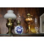 THREE PARAFFIN LAMPS