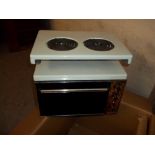 A BOXED SMALL SELEX MINORCOOK OVEN