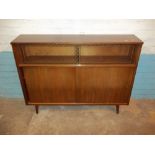 A RETRO TEAK DISPLAY SIDEBOARD WITH SLIDING DOORS