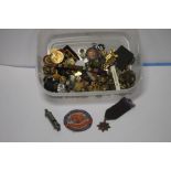 A BOX OF MILITARY AND OTHER BADGES AND BUTTONS ETC