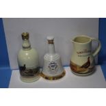 A BELLS WHISKEY DECANTER FAMOUS GROUSE JUG AND A FAMOUS GROUSE DECANTER