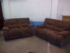 A TWO PIECE SUITE COMPRISING TWO FABRIC TWO SEATER SOFAS