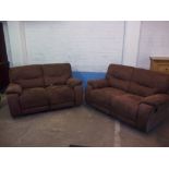 A TWO PIECE SUITE COMPRISING TWO FABRIC TWO SEATER SOFAS