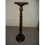 A BARLEY TWIST STYLE TORCHERE PLANT STAND
