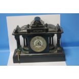 A LATE 19TH CENTURY CLASSICAL STYLE BLACK MARBLE MANTEL CLOCK, WITH GILT METAL DECORATION FITTED