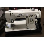 A CASED JONES SEWING MACHINE