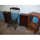 FOUR ITEMS TO INCLUDE A SOLID WOODEN SIDE CUPBOARD, A REPRO SIDE CUPBOARD, AN OAK ROCKING CHAIR