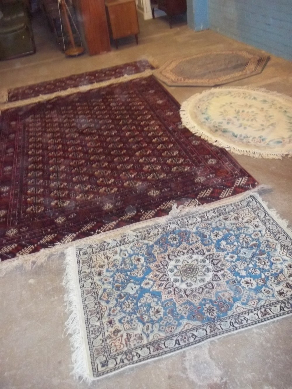 A SELECTION OF FIVE RUGS