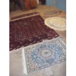 A SELECTION OF FIVE RUGS