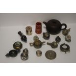 AN ORIENTAL STYLE TEAPOT , A QUANTITY OF METAL MINIATURE FLASKS ETC.