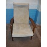 A VINTAGE TEAK RECLINER ARMCHAIR