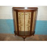 A BOW FRONTED CHINA DISPLAY CABINET
