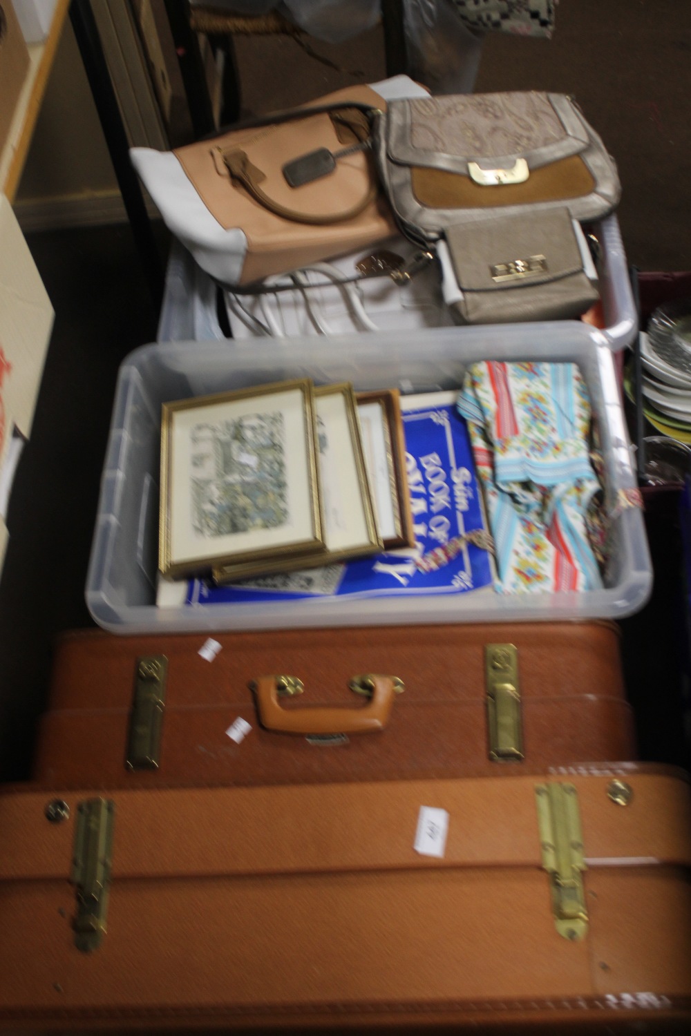 TWO TRAYS OF ASSORTED SUNDRIES TO INCLUDE HANDBAGS, LINEN ETC TOGETHER WITH TWO SUITCASES