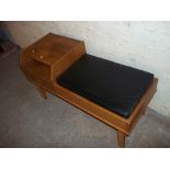 A RETRO TELEPHONE SEAT / MEDIA TABLE