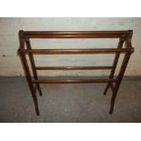 AN EDWARDIAN TOWEL RAIL STAND