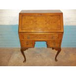 A BURR WALNUT BUREAU MADE BY THOMAS CLARKSON & SONS OF SNOW HILL, WOLVERHAMPTON