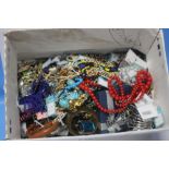 A LARGE BOX OF COSTUME JEWELLERY