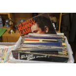 A QUANTITY OF ASSORTED RECORDS TO INCLUDE JOHNNY CASH, SEEKERS, BOWIE, ETC