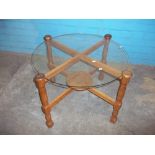 AN UNUSUAL GLASS AND OAK WOOD COFFEE TABLE