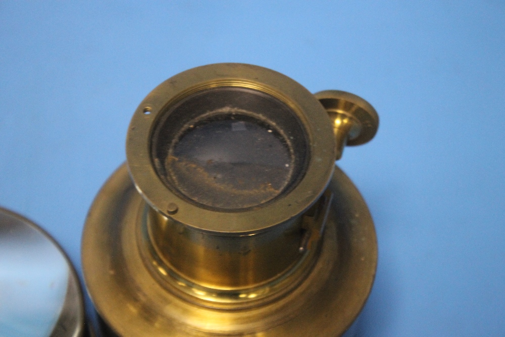 AN ANTIQUE BRASS MAGIC LANTERN LENS TOGETHER WITH ANOTHER (2) - Image 3 of 4