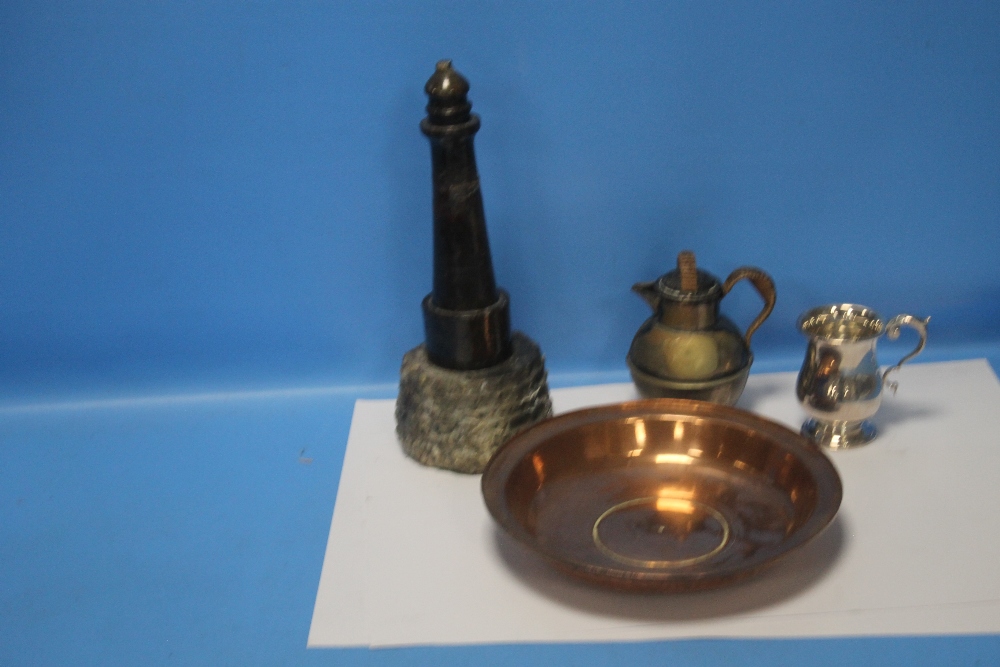 A BRASS CHARGER TOGETHER WITH A MODEL OF A LIGHTHOUSE, A WHITE METAL MUG ETC